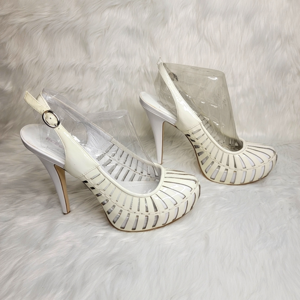 BCBGeneration white patent leather high heel platforms.